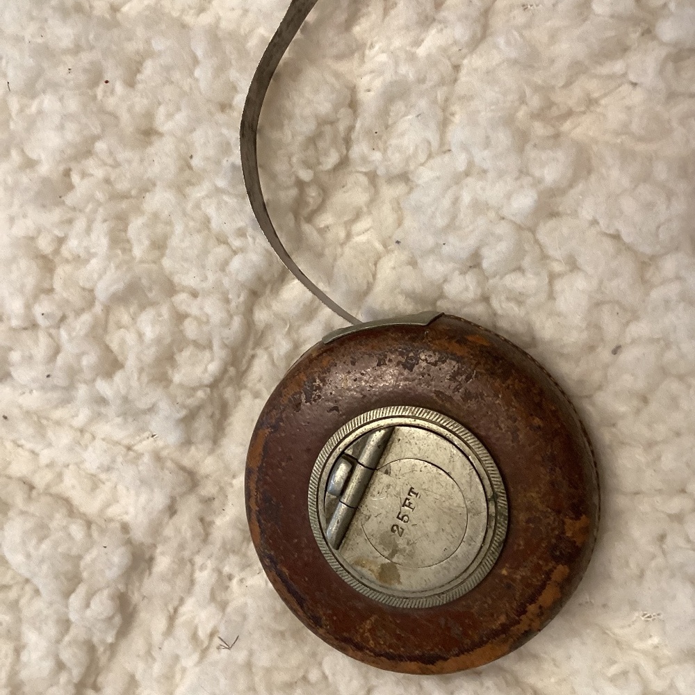 Antique/vintage leather and metal tape measure